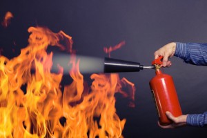 Fire extinguisher and flames