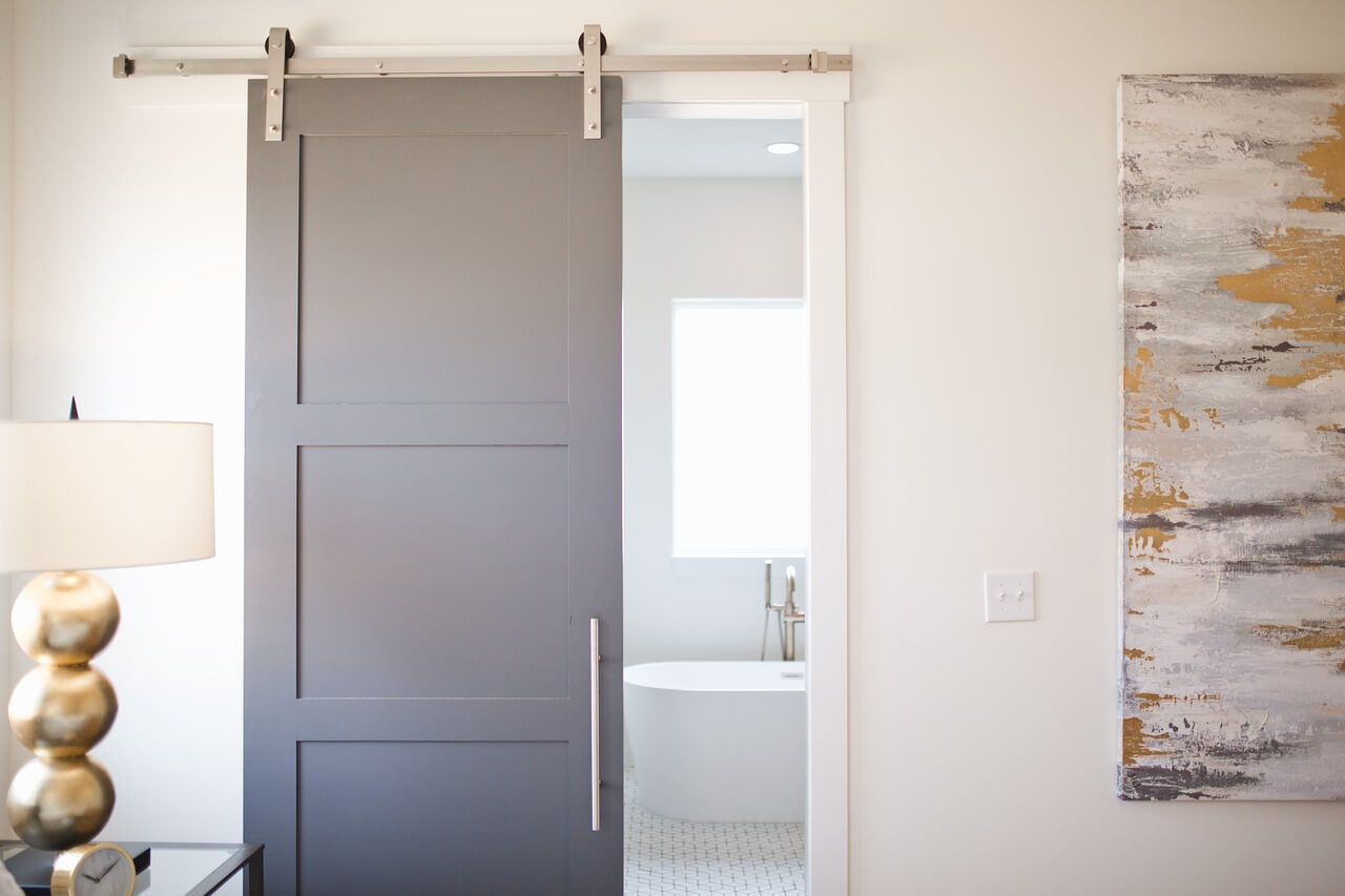 Pros and Cons of Wall-Mounted Sliding Barn Doors - Perry Hood